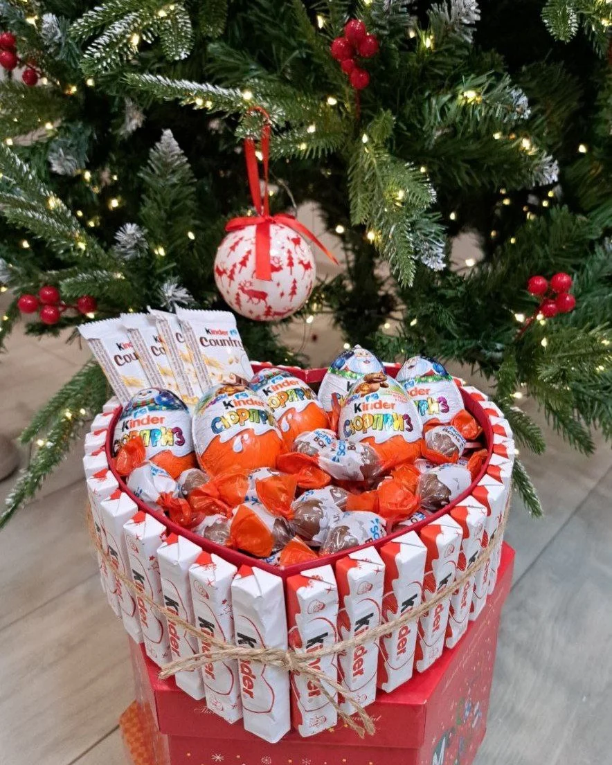 Heart-shaped Kinder chocolate gift box filled with Kinder Bueno and chocolate eggs, a lovely edible gift for friendship Day.