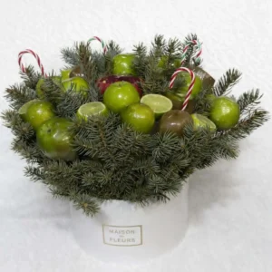 luxury-tangerine-box-pine-gift abovyan Sophisticated Armenian gifts for her: tangerine bouquet in a white hat box with natural evergreen boughs and festive candy canes.