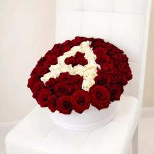 Premium 40cm white hat box featuring over 50 fresh red and white roses arranged into a personalized letter A by BooqArt.
